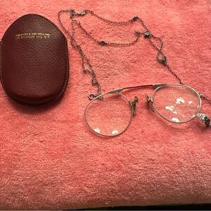 Vintage folding glasses in silver